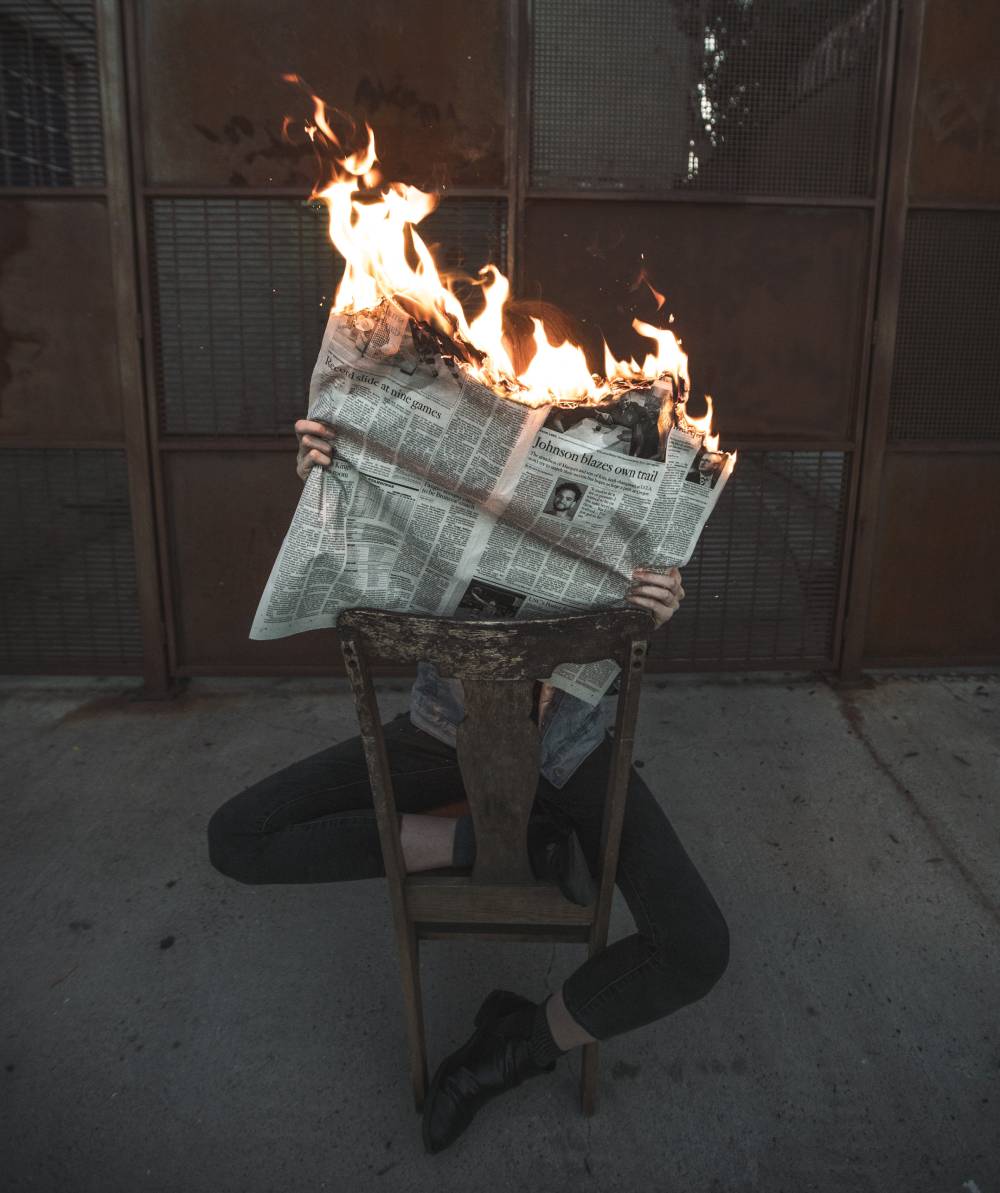 Newspaper on fire