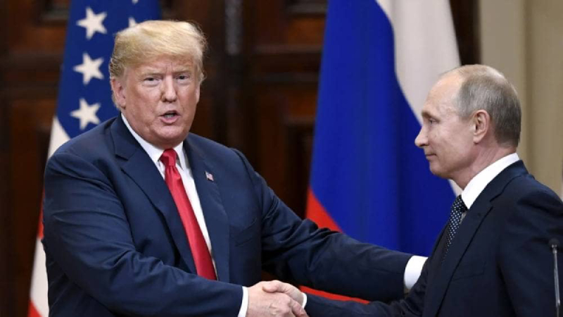 Donald Trump and Vladimir Putin shake hands